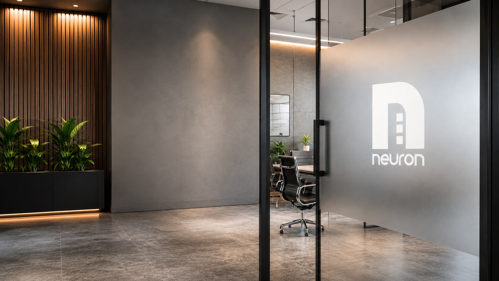 Neuron reception with branded signage on the meeting-room glass